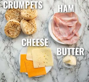 overhead shot of crumpet sandwich ingredients with text labels 